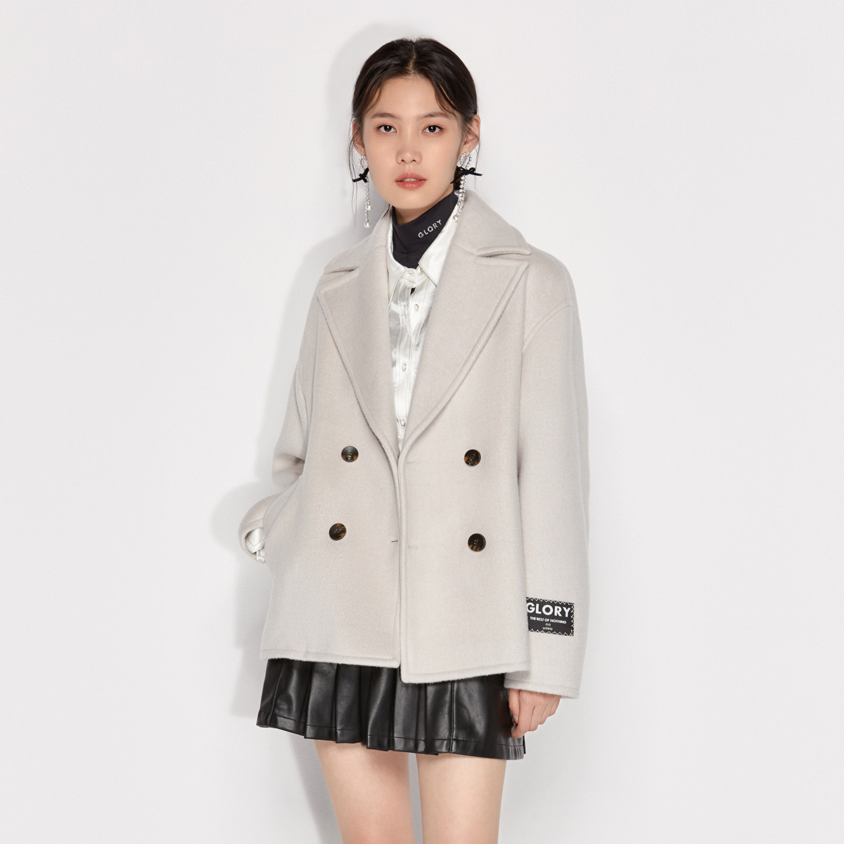 早春翻驳领双排扣羊毛呢外套女